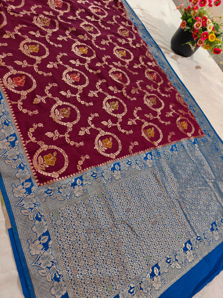 KHADDI GEORGETTE IN GARNET COLOUR WITH ROYAL BLUE BORDER