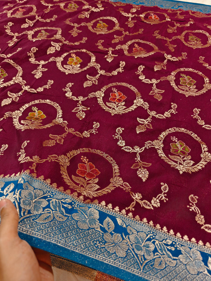 KHADDI GEORGETTE IN GARNET COLOUR WITH ROYAL BLUE BORDER