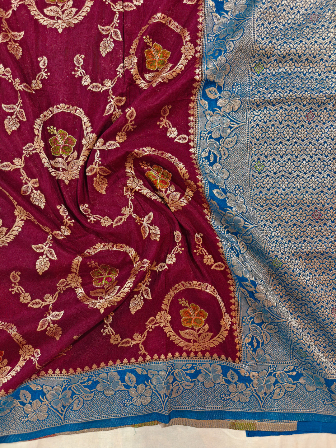 KHADDI GEORGETTE IN GARNET COLOUR WITH ROYAL BLUE BORDER