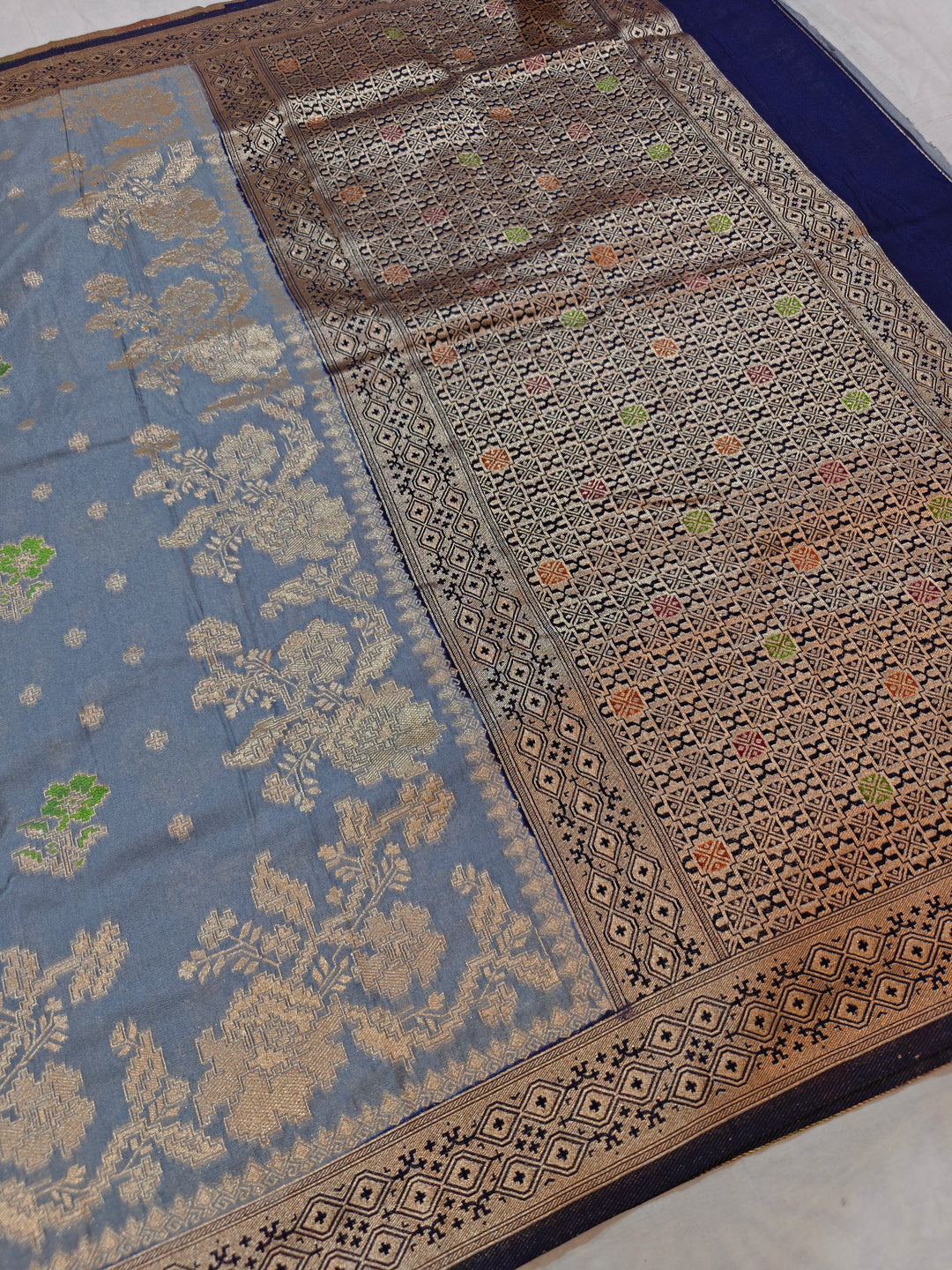 KHADDI GEORGETTE IN GREY WITH NAVY BLUE BORDER