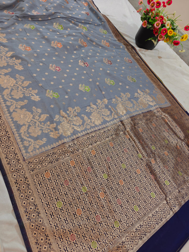 KHADDI GEORGETTE IN GREY WITH NAVY BLUE BORDER