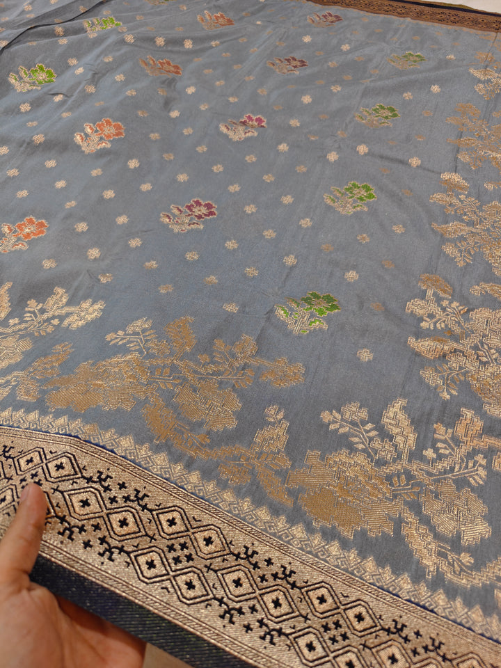 KHADDI GEORGETTE IN GREY WITH NAVY BLUE BORDER