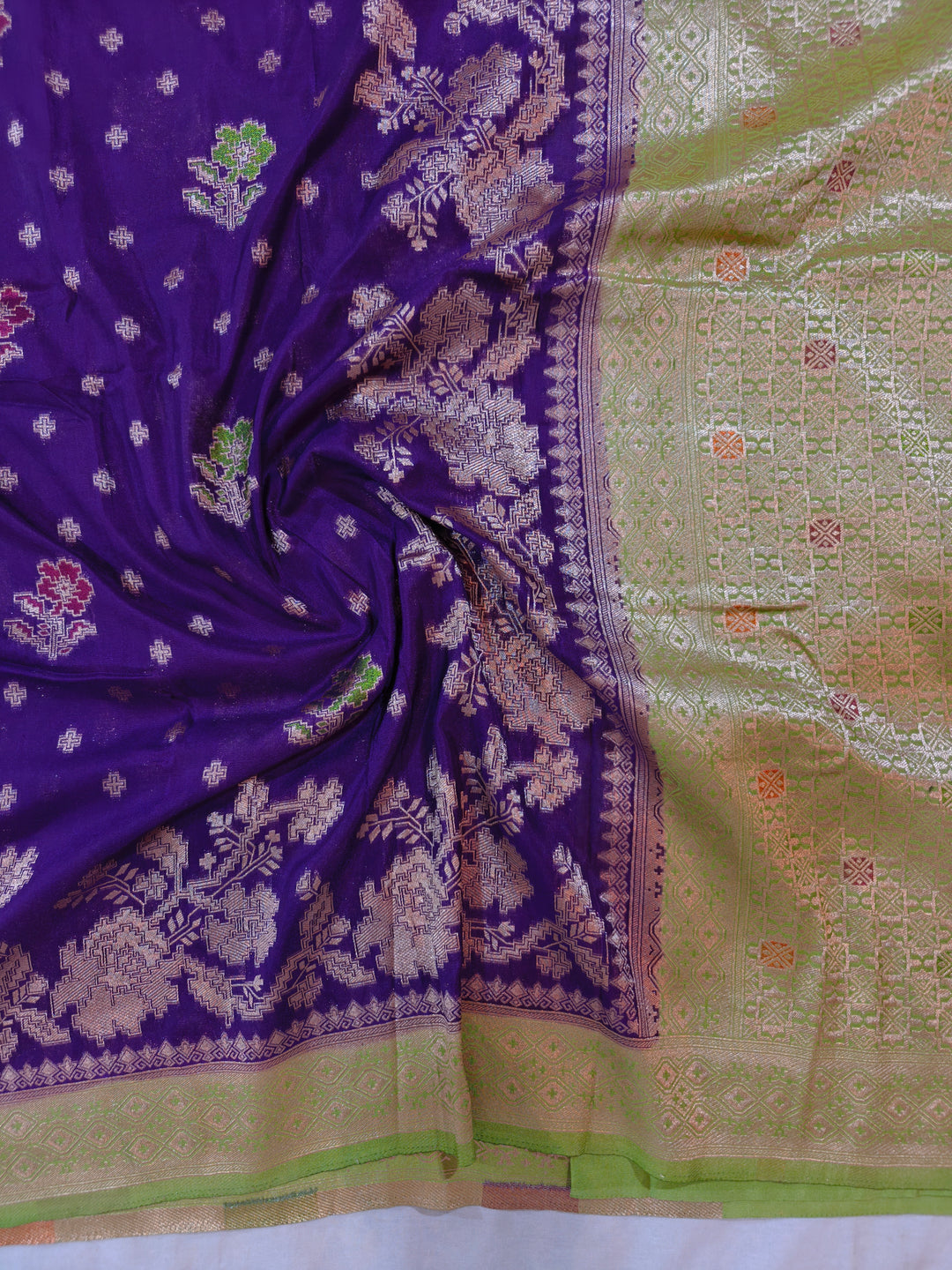 KHADDI GEORGETTE INDIGO COLOUR WITH PARROT GREEN BORDER