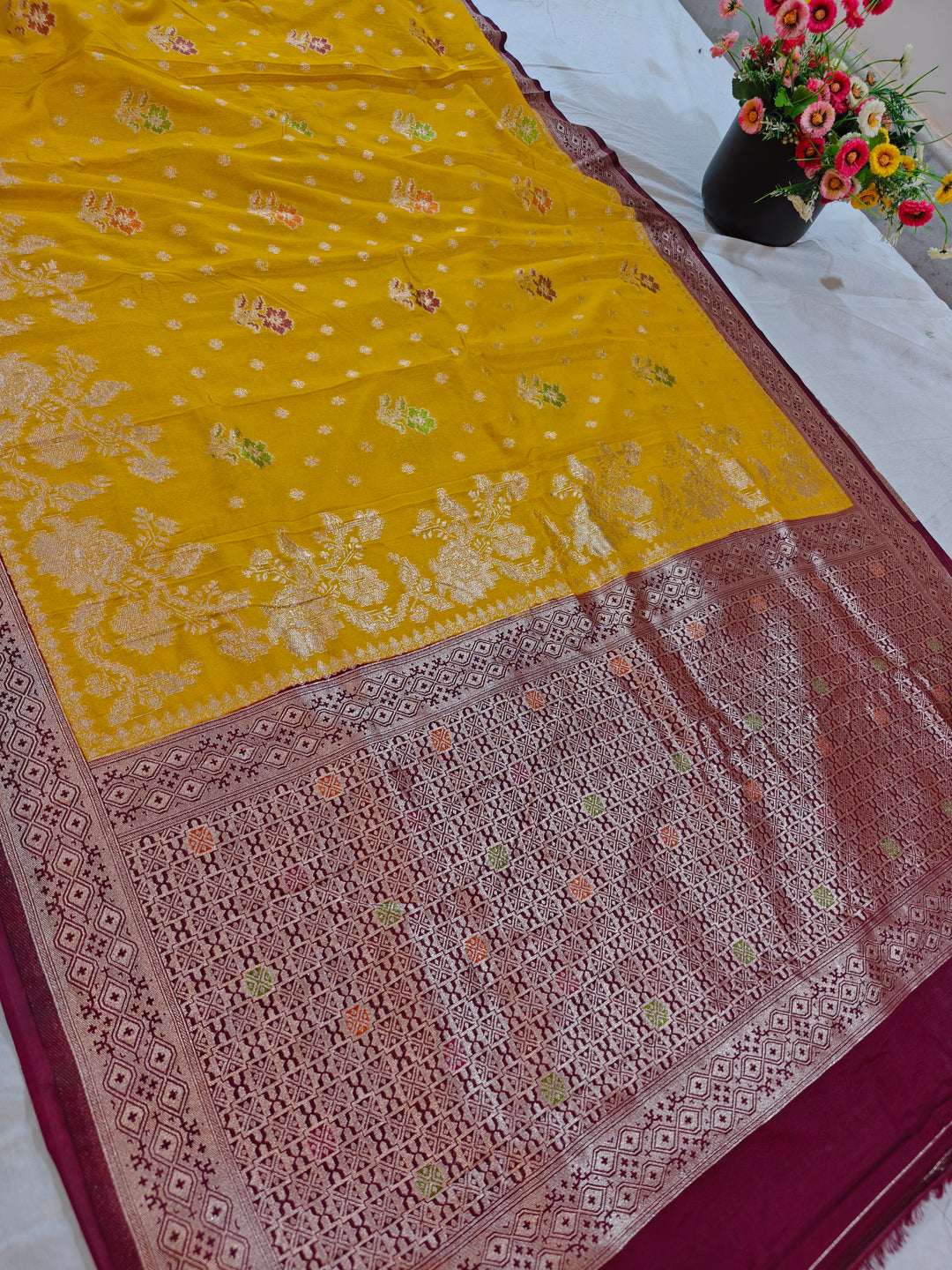 KHADDI GEORGETTE GOLD COLOUR WITH VINE COLOUR BORDER