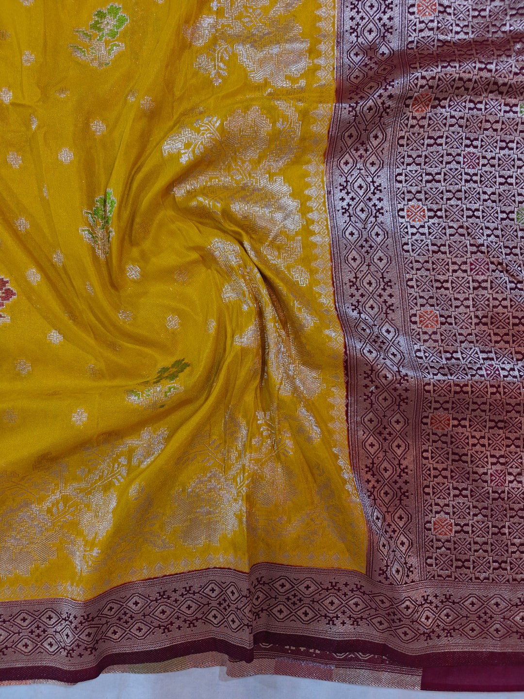KHADDI GEORGETTE GOLD COLOUR WITH VINE COLOUR BORDER