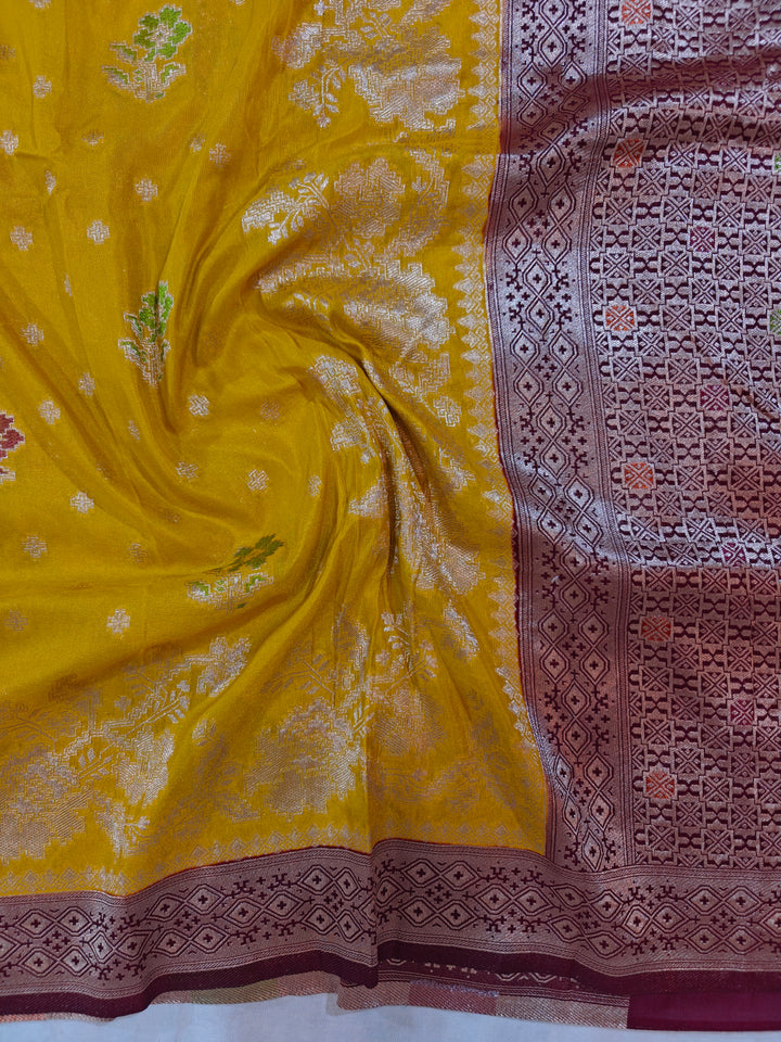 KHADDI GEORGETTE GOLD COLOUR WITH VINE COLOUR BORDER